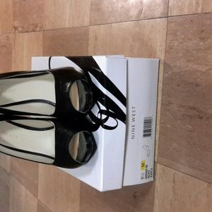 Black leather platform peep toes heels