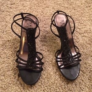 New York transit black heels.