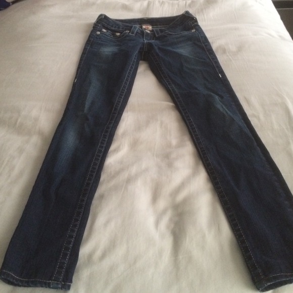 Skinny and dark True Religion jeans with gems