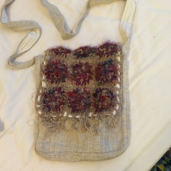 Crossbody bag with silk designs.