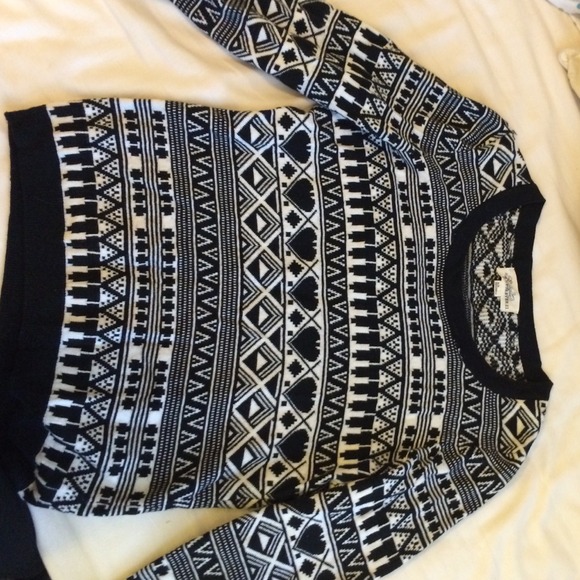 Black and white 3/4 length sweater.