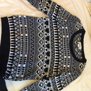 Black and white 3/4 length sweater.