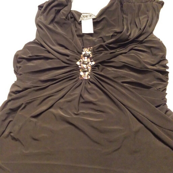 After 5 embellished black fancy top.
