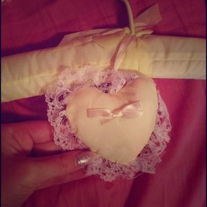 Set of four stylish hangers pastel