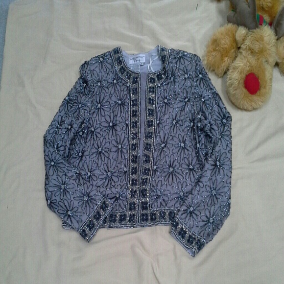 Beatiful sequined jacket, blue on grey. Fully line