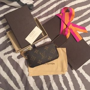 Brand new never used Louis Vuitton change purse