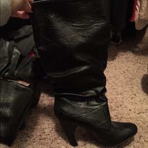 Black tall boots with heel