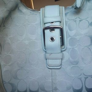Baby blue Coach purse w/ zipper and a buckle!