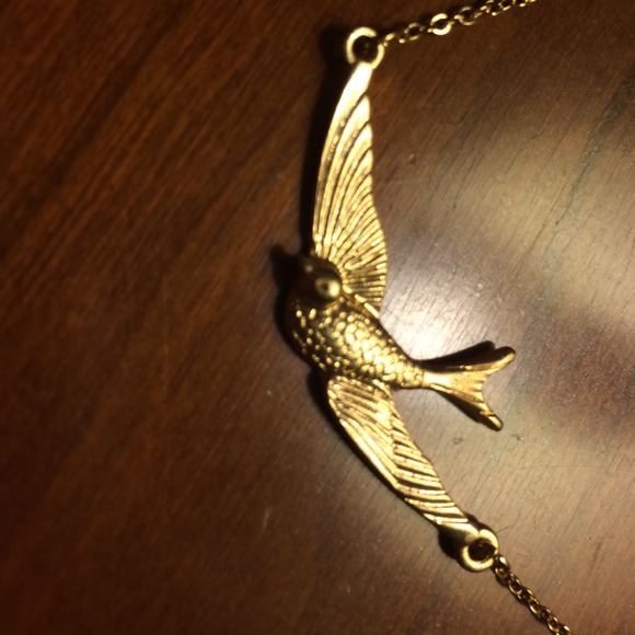 Golden bird necklace