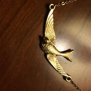 Golden bird necklace