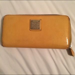 Authentic Dooney & Burke yellow leather wallet