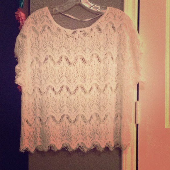 a white lace see through blouse perfect for summer