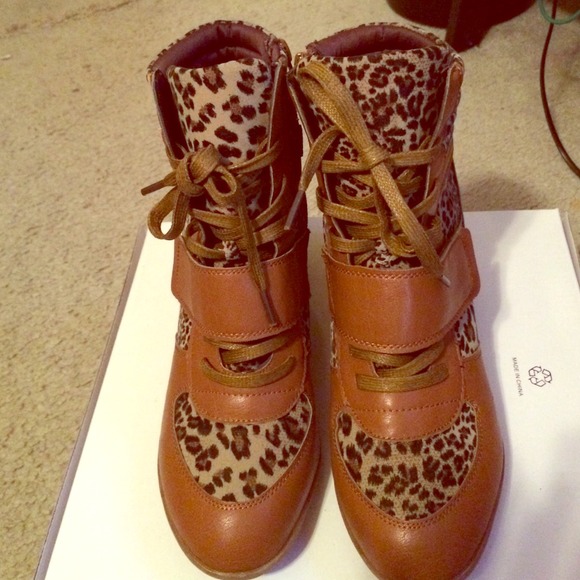Wedge cheetah print high tops