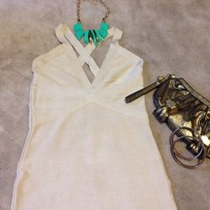 Nude taupe bandage BEBE DRESS hold you in style!