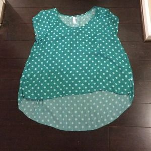Green and white polka dot blouse