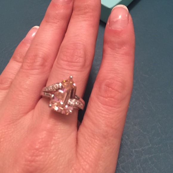 Sterling silver and pink sapphire and diamond ring