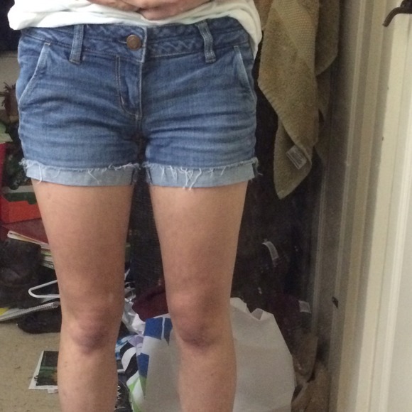 Light wash midi shorts.