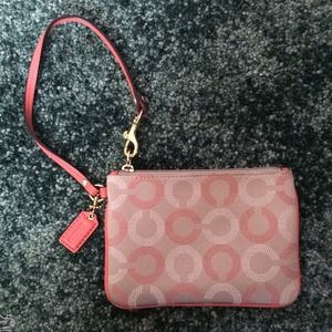 Coach pink and grey wristlet
