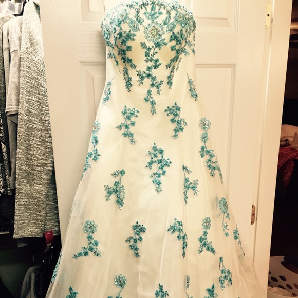 White and turquoise evening gown.