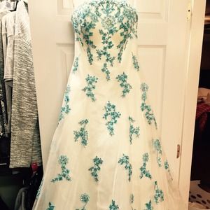 White and turquoise evening gown.