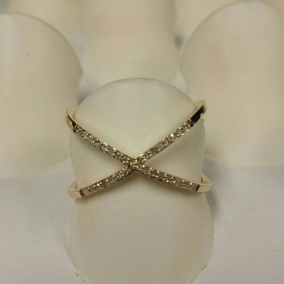 14kt gold  and diamond X ring