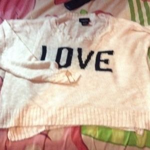 Pink long sleeve shirt that says love