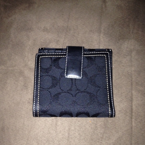 Never been used Coach black wallet