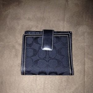 Never been used Coach black wallet