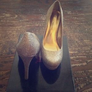 Gold high heels