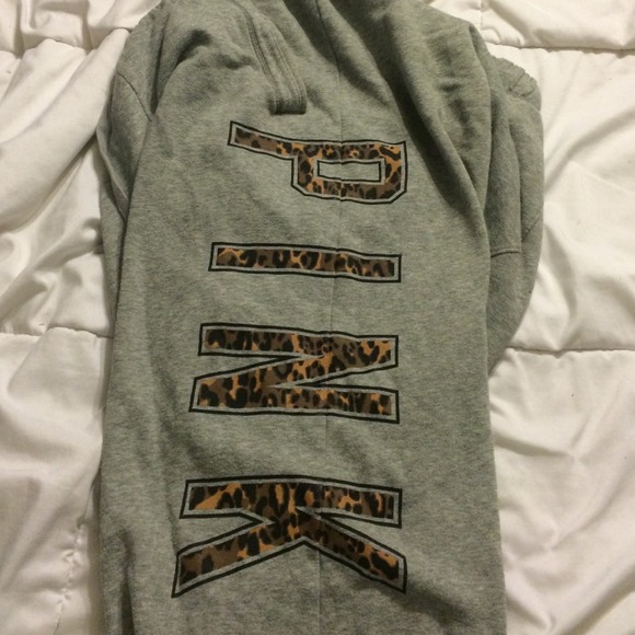 Victoria's Secret PINK cheetah sweatpants.
