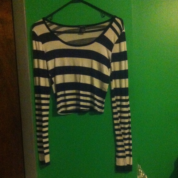 White and black striped shirt, cropped.