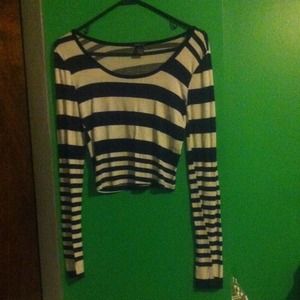 White and black striped shirt, cropped.