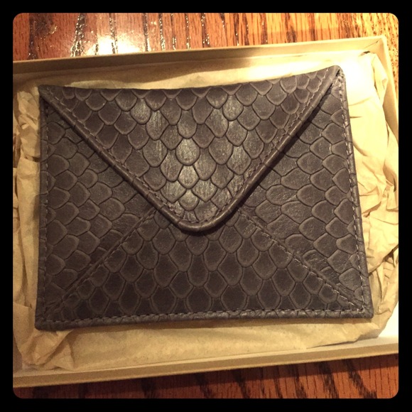 Linea Pelle Handbags - Linea pelle mini grey Python envelope⬇️⬇️⬇️