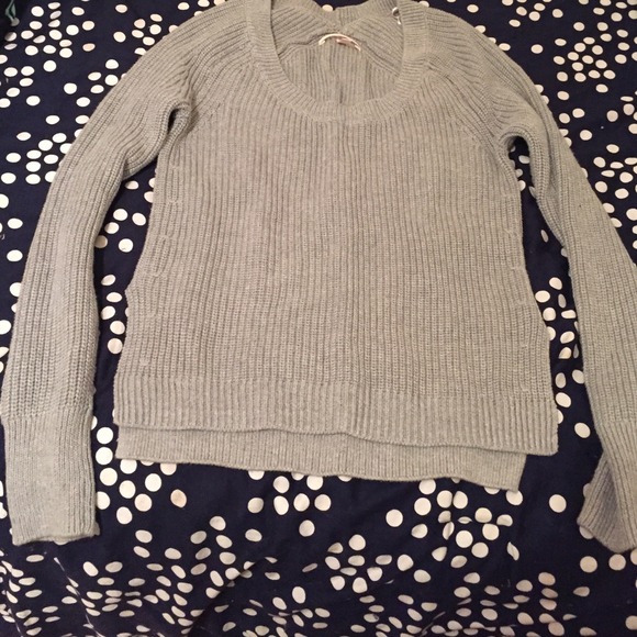 A grey Victoria's Secret sweater