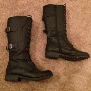 Tall combat boots, excellent condition.