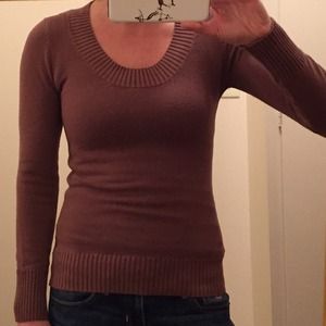 Brown sweater with low neckline