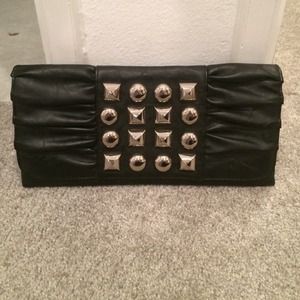 Black clutch with silve studs and spikes