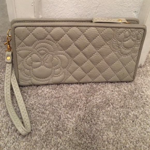 Grey wallet with gold accents