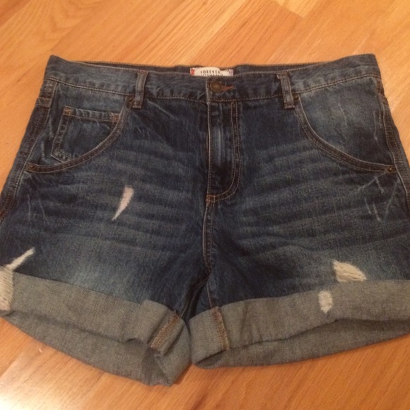 High waisted dark wash semi distressed jean shorts