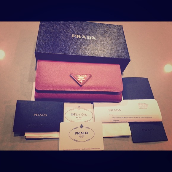 Prada Clutches & Wallets - Authentic Prada Saffiano Triang Wallet