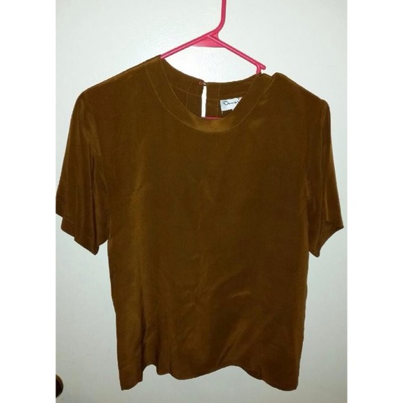 Bronze colored Oscar dela Renta shirt