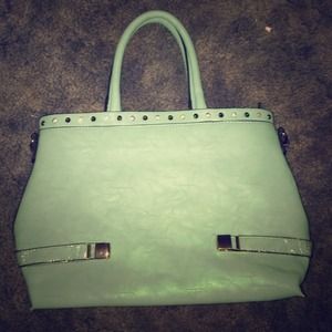 Light blue/green purse with extra hidden pocket