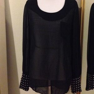 Black chiffon top with button down back