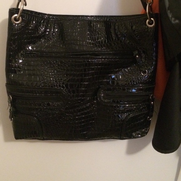 Black purse brand new the brand is Alfred dunner