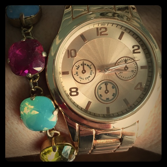 NIB rose gold watch