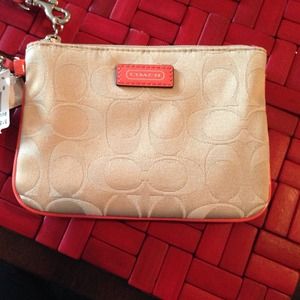 Brand new tags still on coach wristlet