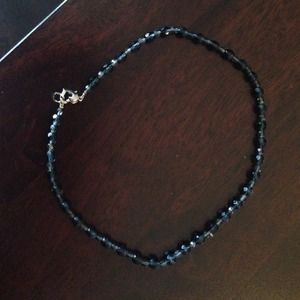 Navy beaded necklace with heart shaped clasp