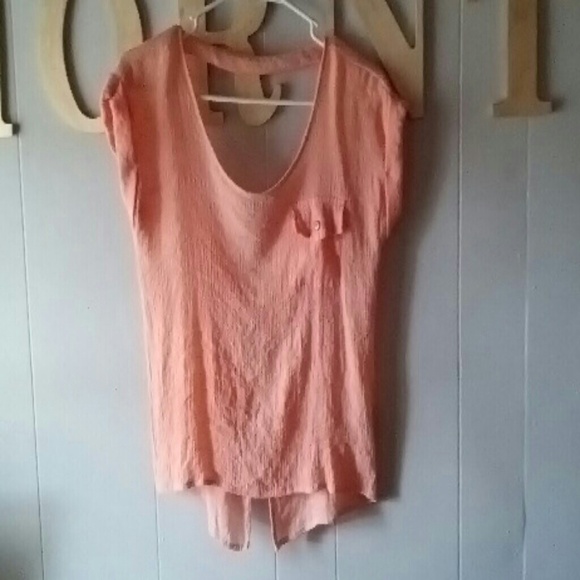 Coral pink shirt bows on the back. Worn once