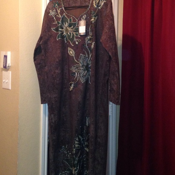 New beaded gown from Afghanistan . Brown