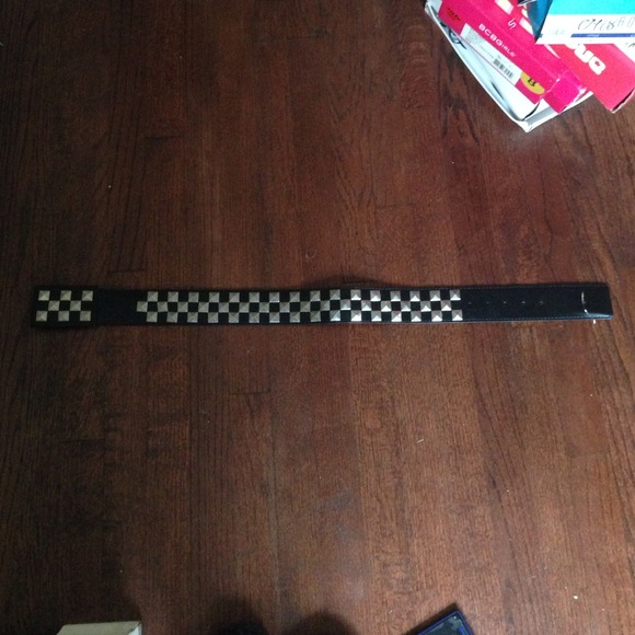 A Black Dress Belt With Silver Studs